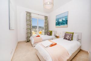 Letto o letti in una camera di Hillock Residence Apartments