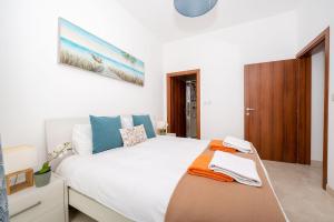 Letto o letti in una camera di Hillock Residence Apartments