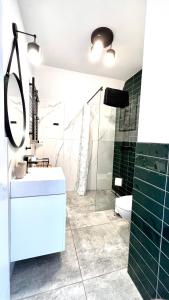 Ένα μπάνιο στο Apartament Katedralna 10