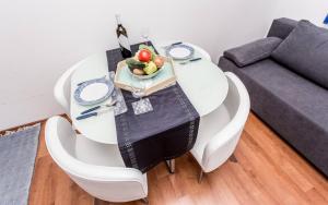 Posedenie v ubytovaní Apartments Zeljko B