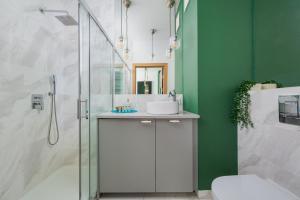 Koupelna v ubytování GO Apartments - ApartHotel