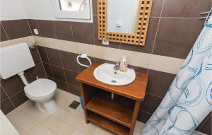 Koupelna v ubytování One-Bedroom Apartment In Vir