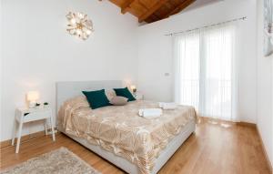 Posteľ alebo postele v izbe v ubytovaní Two-Bedroom Holiday Home In Volme