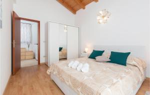 Posteľ alebo postele v izbe v ubytovaní Two-Bedroom Holiday Home In Volme