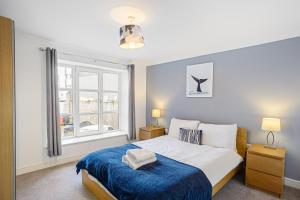 Voodi või voodid majutusasutuse Bookbinders Apartments Leeds City Centre toas