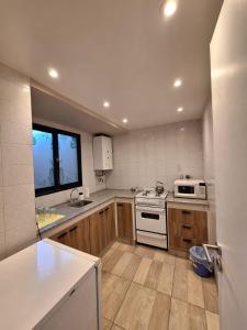 Dapur atau dapur kecil di Apart Hotel Marilian