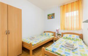 Posteľ alebo postele v izbe v ubytovaní Lovely Apartment In Fazana With Kitchen