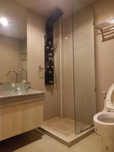 a bathroom with a sink and a glass shower at AD resort ชะอำ in Ban Bo Khaem