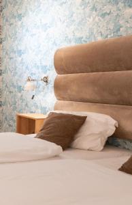 Postel nebo postele na pokoji v ubytování Hotel Medo Köln