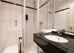 Koupelna v ubytování Hotel Medo Köln