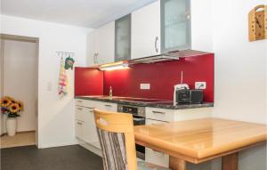 Kuchyň nebo kuchyňský kout v ubytování Ferienwohnung - Wald Am Arlb,