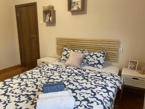 Ένα ή περισσότερα κρεβάτια σε δωμάτιο στο Cozy Trg