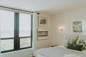 En eller flere senge i et værelse på The Spoleto