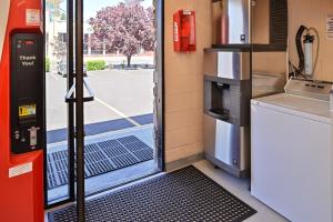 an open door of a food truck with a vending machine at The Maverick Motel, Main Street USA Collection by PNW Hospitality in Klamath Falls
