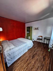 A bed or beds in a room at Patio Urbano Suites & beds