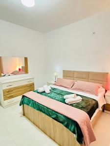 Giường trong phòng chung tại C Villa