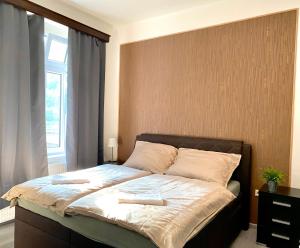 Postel nebo postele na pokoji v ubytování Hotel Labe