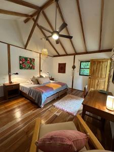 Ένα ή περισσότερα κρεβάτια σε δωμάτιο στο Tierra Encantada +108 φωτογραφίες