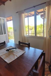 a wooden table with a gun on top of it at Apartamento Del Paseo in Federación