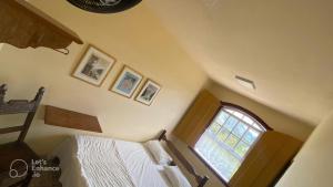 Postel nebo postele na pokoji v ubytování Brumas Ouro Preto Hostel e Pousada