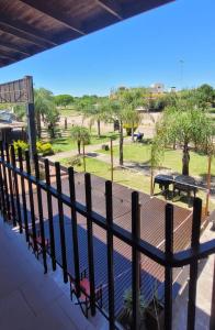 a balcony with a view of a park at Apartamento Del Paseo in Federación