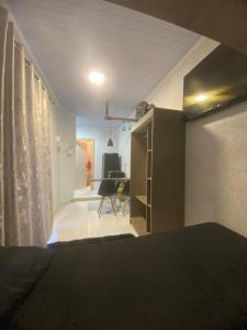 TV a/nebo společenská místnost v ubytování Loft shopping Catuai e lago