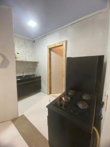 Kuchyň nebo kuchyňský kout v ubytování Loft shopping Catuai e lago