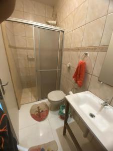 Koupelna v ubytování Loft shopping Catuai e lago