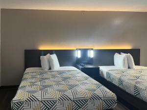 Postel nebo postele na pokoji v ubytování Motel 6 Dumas, TX
