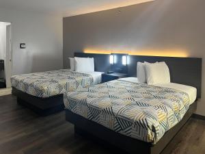 Postel nebo postele na pokoji v ubytování Motel 6 Dumas, TX + 17 fotografií