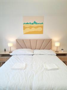 Ένα ή περισσότερα κρεβάτια σε δωμάτιο στο BEIGE Bed