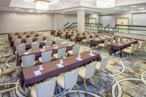 a large banquet hall with tables and chairs at Memphis Vitality Hotel in Memphis +85 photos