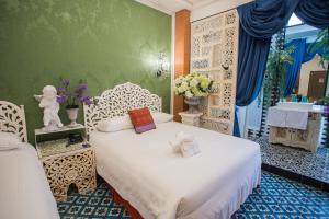 Ένα ή περισσότερα κρεβάτια σε δωμάτιο στο Anna King Hotel