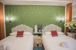 Ένα ή περισσότερα κρεβάτια σε δωμάτιο στο Anna King Hotel