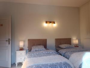 Postel nebo postele na pokoji v ubytování Auberge du Freney