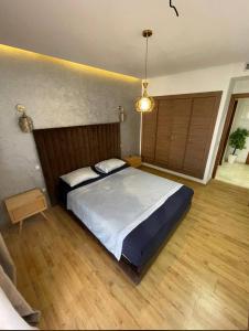 Ένα ή περισσότερα κρεβάτια σε δωμάτιο στο AMIZING Apartments Marrakech WAZO