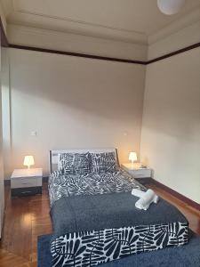 Postel nebo postele na pokoji v ubytování Easy Host Porto