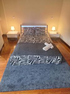 Postel nebo postele na pokoji v ubytování Easy Host Porto
