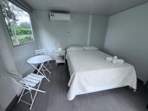 Postel nebo postele na pokoji v ubytování Cautiva Sleep Inn