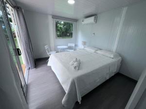 Postel nebo postele na pokoji v ubytování Cautiva Sleep Inn