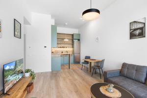 Kuchyňa alebo kuchynka v ubytovaní Apt w Downtown View & Garage Parking