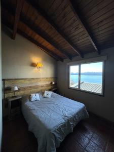 Postel nebo postele na pokoji v ubytování Bariloche Hostel