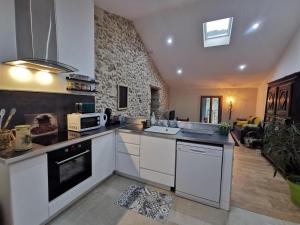 Kuchyň nebo kuchyňský kout v ubytování GÎTE 3* SAINT GUILHEM LE DESERT CHEZ MARIUS