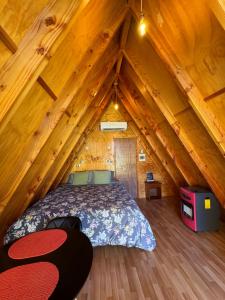 Voodi või voodid majutusasutuse A-FRAME CABIN PUCON toas