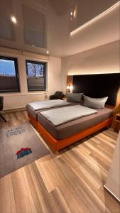 Postel nebo postele na pokoji v ubytování Hotel Gästehaus Linden