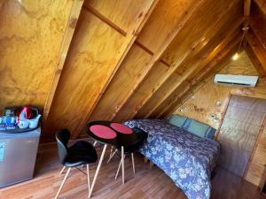 Voodi või voodid majutusasutuse A-FRAME CABIN PUCON toas