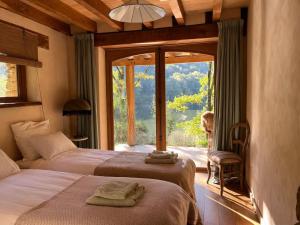 Posteľ alebo postele v izbe v ubytovaní Lake House I // Alauzet Ecolodge + Nature spa