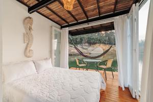 Letto o letti in una camera di Hotel Pietrasanta