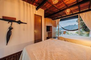 Letto o letti in una camera di Hotel Pietrasanta
