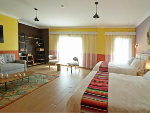 Postelja oz. postelje v sobi nastanitve Hotel Boutique Típico